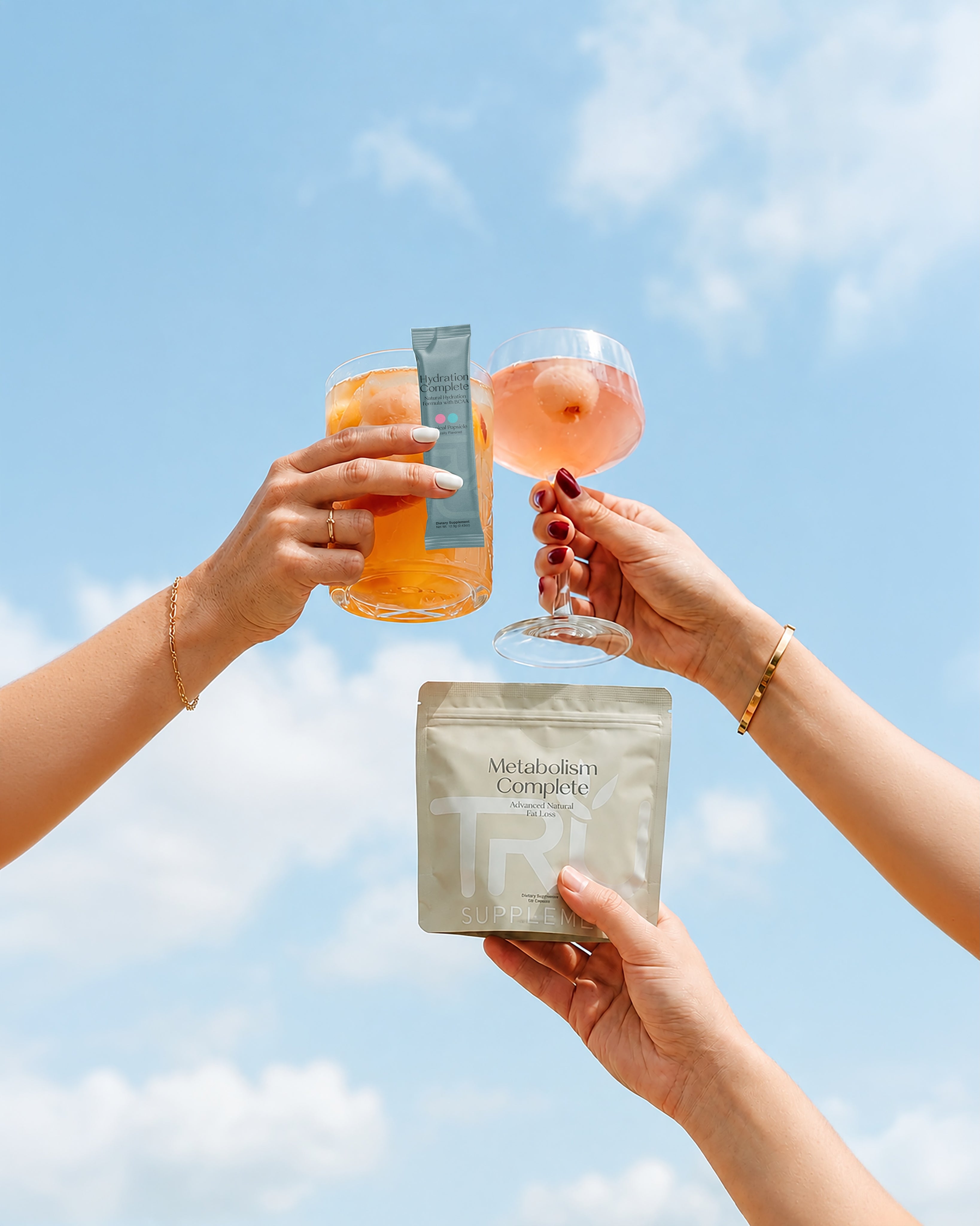 Two people toasting with TRU Protein shakes